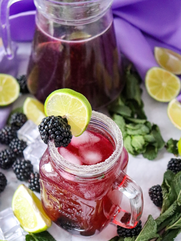 Pouring-A-glass-of-Blackberry-Mojito-Mocktail-as-one-of-Blackberry-Mojito-Mocktail-recipe