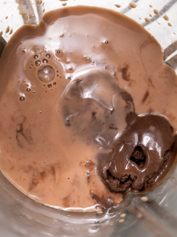 Blend the chocolate milk and oat milk on heat