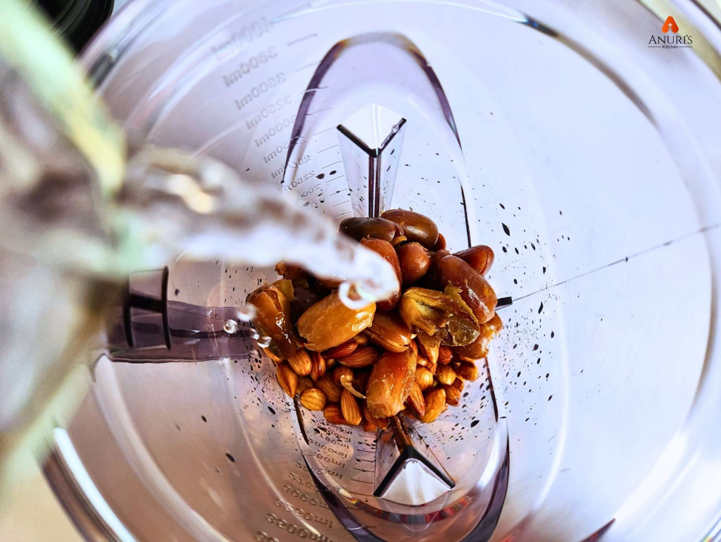 Blending all the ingredients together to get the milk