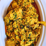Freshly made Egusi soup served in a white dish