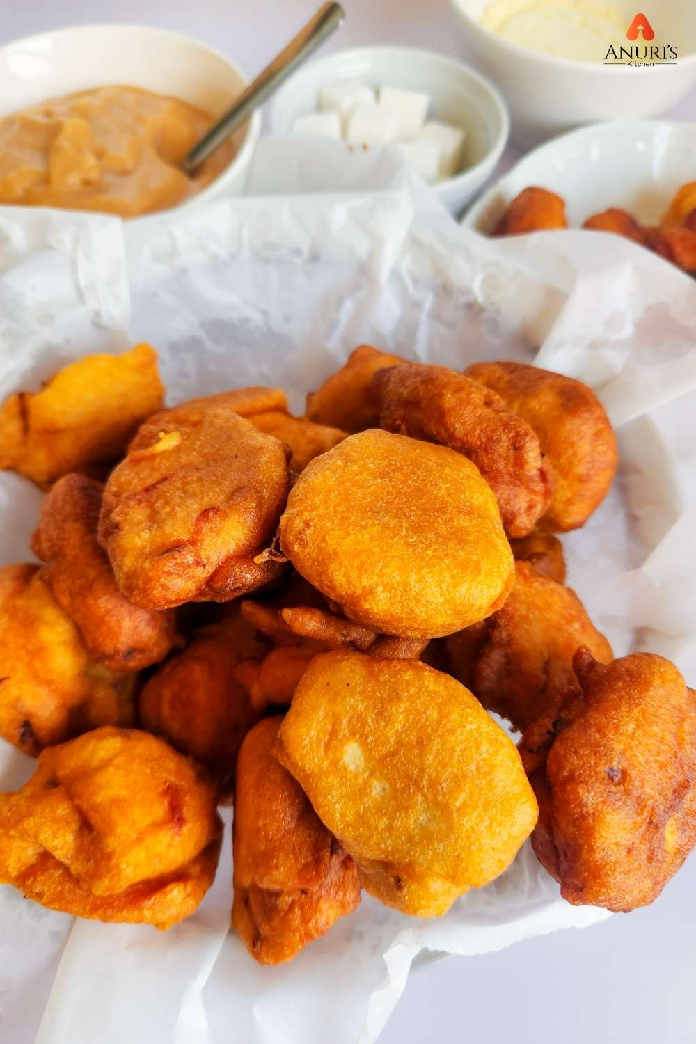 Akara served on a white dish with pap