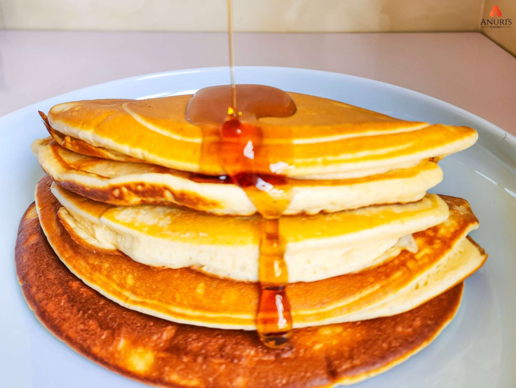 Fluffy pancakes with strawberry toppings